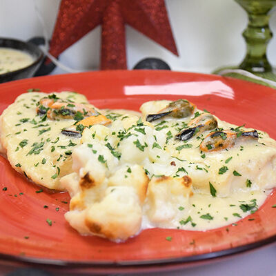 Lomos de carbonero con velout&eacute; de mejillones