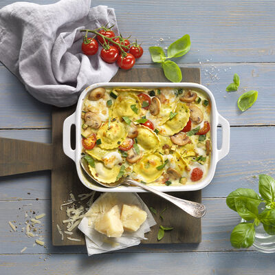 Ravioli de ricotta y espinacas gratinados con champiñones