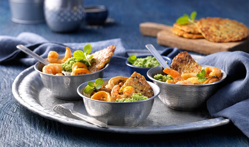 Mariscos a la marinera con hummus de br&oacute;coli