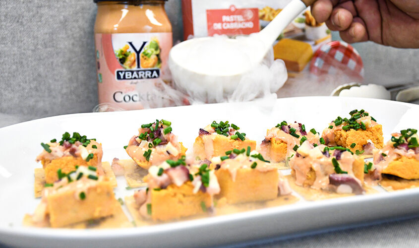 Pastís d'escórpora amb salpicó de pop i mar