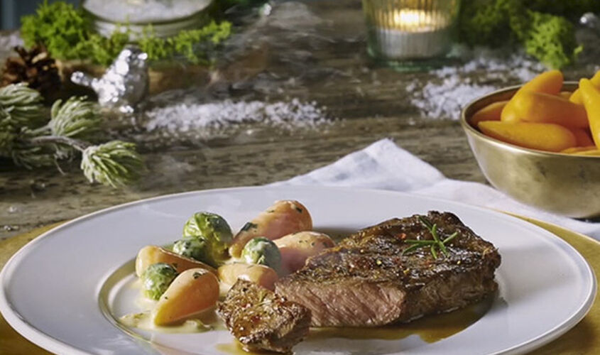 Bistec boví de Sud-amèrica amb pastanagues baby en mostassa i mel