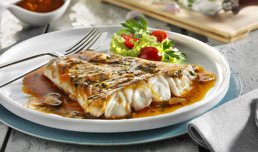 Filets de bacall&agrave; al forn amb pebre vermell